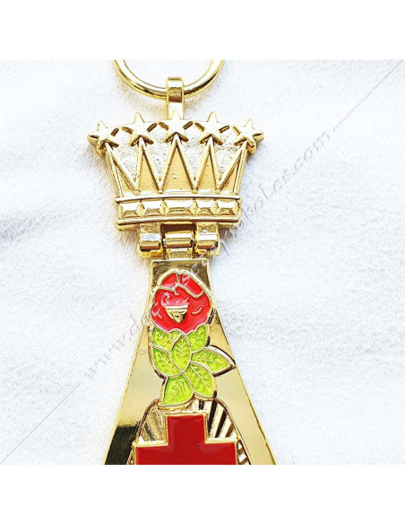 Doré à l'or fin, pélican et croix émaillés